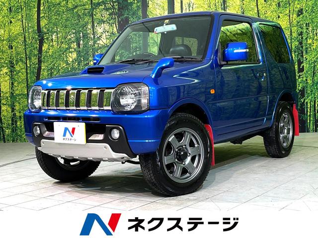 スズキ ジムニー クロスアドベンチャーＸＣ　４ＷＤ　禁煙車　ＳＤナビ　バックカメラ　シートヒーター　ＥＴＣ　ハーフレザーシート　ＣＤ／ＤＶＤ再生　フォグライト　トラクションコントロール　盗難防止装置　電動格納ミラー