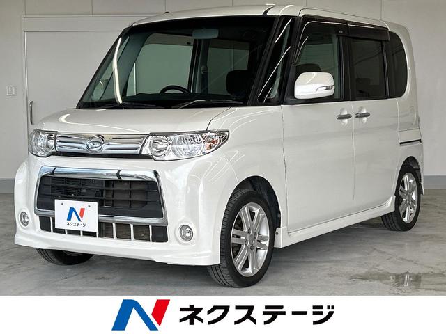 沖縄県の中古車ならタント カスタムＲＳ　電動スライドドア　ＳＤナビ　バックカメラ　Ｂｌｕｅｔｏｏｔｈ再生　フルセグＴＶ　ＥＴＣ　ＨＩＤヘッドライト　スマートキー　革巻きステアリング　１５インチアルミホイール　フォグライト　ＤＶＤ再生