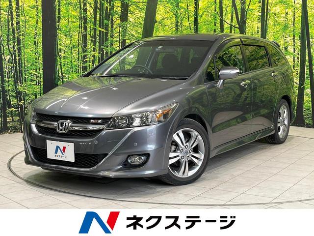 ホンダ ストリーム ＲＳＺ　ＨＤＤナビパッケージ　純正ナビ　禁煙車　バックカメラ　ＥＴＣ　コーナーセンサー　パドルシフト　ＨＩＤヘッドライト　オートライト　オートエアコン　純正１７インチアルミホイール　純正革巻きステアリング　電動格納ミラー