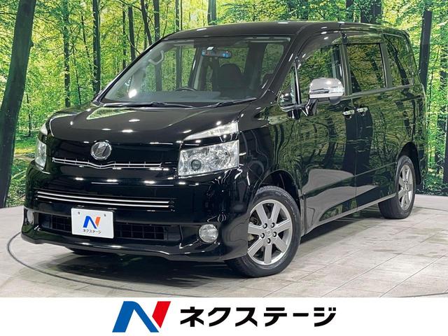 トヨタ ヴォクシー ＺＳ　煌ＩＩ　４ＷＤ　寒冷地仕様　両側電動スライドドア　純正ナビ　Ｂｌｕｅｔｏｏｔｈ　バックカメラ　ＥＴＣ　ＨＩＤヘッドライト　スマートキー　オートライト　革巻きステアリング　パドルシフト　デュアルオートエアコン