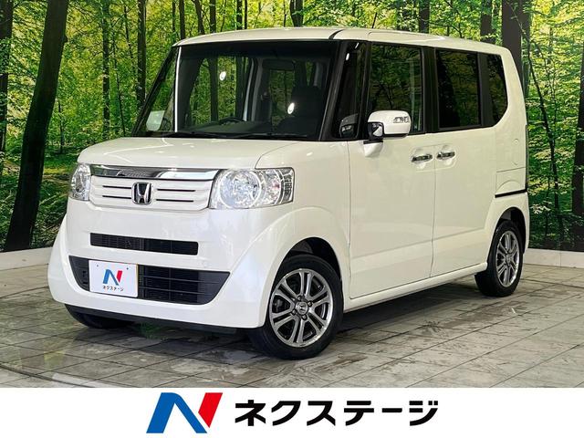 ホンダ Ｎ－ＢＯＸ Ｇ　ターボＳＳパッケージ　純正ＳＤナビ　両側電動ドア　バックカメラ　クルコン　ＥＴＣ　禁煙車　スマートキー　ＨＩＤヘッド　純正１４インチアルミ　オートライト　オートエアコン　革巻きステアリング　ステアリングスイッチ