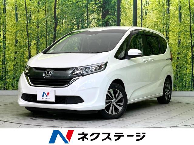 Ｇ・ホンダセンシング　ホンダセンシング　レーダクルーズコントロール　禁煙車　純正ナビ　バックカメラ　リアモニター　ＥＴＣ　両側電動スライドドア　Ｂｌｕｅｔｏｏｔｈ再生　車線逸脱警報　ＨＩＤヘッドライト　スマートキー　ＵＳＢ(1枚目)