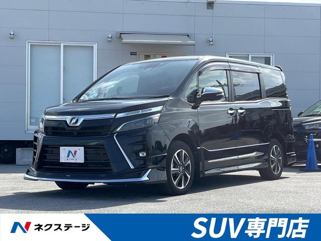 沖縄県の中古車ならヴォクシー ＺＳ　煌ＩＩ　モデリスタエアロ　ＢＩＧ－Ｘ１１インチ　フリップダウンモニター　両側パワースライドドア　セーフティセンス　フルセグ　Ｂｌｕｅｔｏｏｔｈ再生　ＬＥＤヘッドライト　純正１６インチアルミホイール