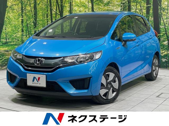 フィットハイブリッド(ホンダ) Ｆパッケージ　純正ナビ　バックカメラ　Ｂｌｕｅｔｏｏｔｈ　ＥＴＣ　スマートキー　シートリフター 中古車画像