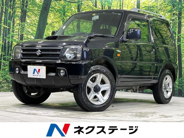 スズキ ジムニー ワイルドウインド　４ＷＤ　ＳＤナビ　シートヒーター　ルーフレール　ダイヤル式エアコン　電動格納ミラー　ヘッドライトレベライザー　純正革巻きステアリング　プライバシーガラス