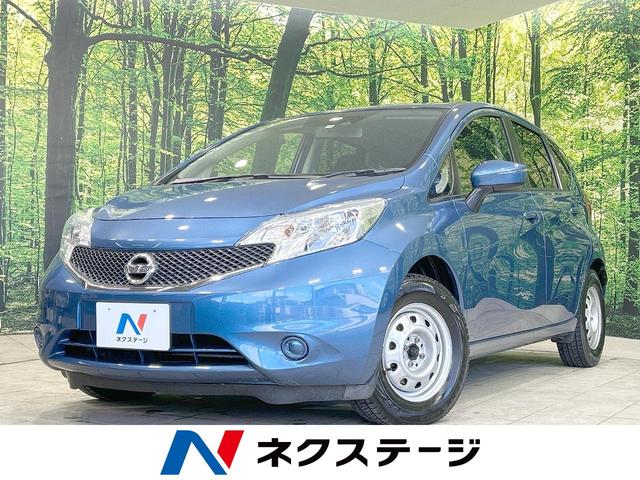 日産 ノート Ｘ　禁煙車　衝突軽減装置　純正ナビ　バックカメラ　ＥＴＣ　スマートキー　車線逸脱警報　アイドリングストップ　横滑り防止装置　電動格納ミラー　プライバシーガラス　ヘッドライトレベライザー　フロアシフト