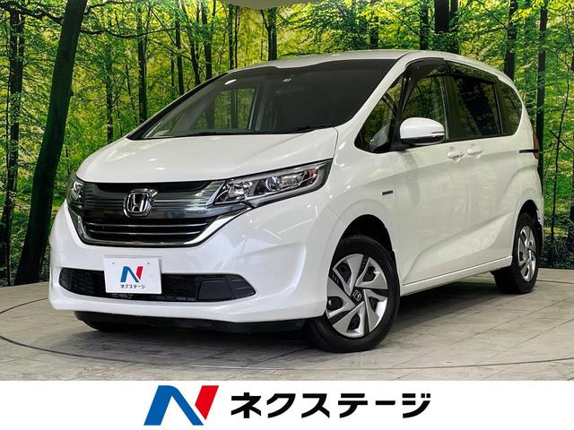 ハイブリッド・Ｇホンダセンシング　禁煙車　純正８型ナビ　バックカメラ　４ＷＤ　ホンダセンシング　両側電動スライドドア　ＬＥＤヘッドライト　前席シートヒーター　レーダークルーズコントロール　Ｂｌｕｅｔｏｏｔｈ接続　ＥＴＣ　スマートキー(1枚目)