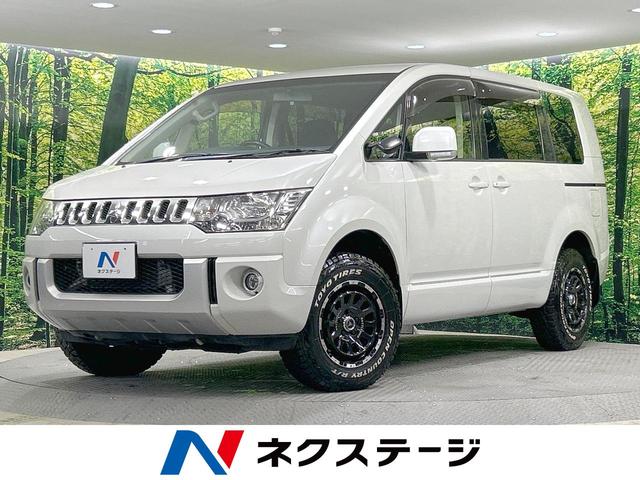 Ｄ　パワーパッケージ　４ＷＤ　禁煙車　Ａｌｐｈｉｎｅ製フリップダウンモニター　純正ＳＤナビ　両側電動スライドドア　クルーズコントロール　前席シートヒーター　バックカメラ　ＨＩＤヘッドライト　オートライト　横滑り防止装置(1枚目)