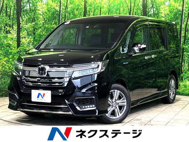 ホンダ ステップワゴンスパーダ スパーダハイブリッド　Ｇ・ＥＸ　ホンダセンシング　純正１０型ナビ　ホンダセンシング　レーダークルーズ　両側電動ドア　ハーフレザー　シートヒーター　純正１６インチアルミ　プラズマクラスター付オートエアコン　ＬＥＤヘッド　スマートキー　ＥＴＣ　禁煙車