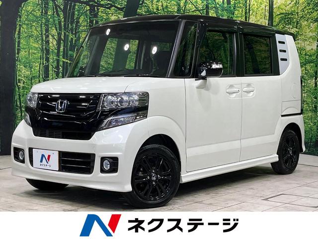 ホンダ Ｎ－ＢＯＸカスタム ２トーンカラースタイル　Ｇ・Ｌパッケージ　禁煙車　純正ナビ　両側パワースライド　衝突軽減システム　バックカメラ　Ｂｌｕｅｔｏｏｔｈ接続　フルセグＴＶ　ＨＩＤヘッドライト　スマートキー　革巻きステアリング　盗難防止装置　プライバシーガラス