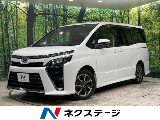 ヴォクシー(トヨタ) ＺＳ　禁煙車　衝突軽減装置　フリップダウンモニター　純正１０型ナビ　両側パワースライドドア　リアオートエアコン 中古車画像