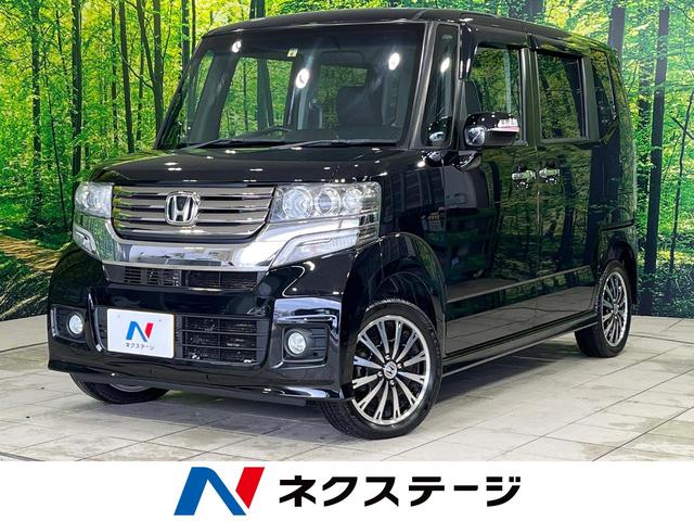 ホンダ Ｎ－ＢＯＸカスタム Ｇ・ターボパッケージ　４ＷＤ　禁煙車　両側電動スライドドア　純正ナビ　バックカメラ　クルコン　ＨＩＤヘッド　パドルシフト　純正１５インチアルミ　オートエアコン　革巻きステアリング　アームレスト　ウィンカーミラー