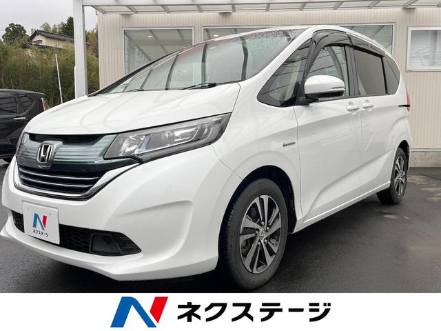 ハイブリッド・ＥＸ　純正ナビ　禁煙車　ホンダセンシング　両側電動スライドドア　フルセグＴＶ　バックカメラ　ｂｌｕｅｔｏｏｔｈ　ハーフレザーシート　純正１５インチＡＷ　スマートキー　衝突被害軽減システム(1枚目)