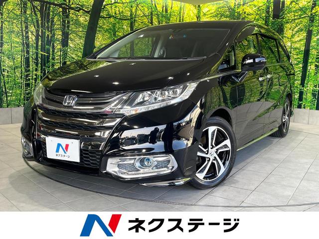 オデッセイ(ホンダ) アブソルート　フリップダウンモニター　電動スライドドア　衝突軽減装置　禁煙車　純正８型ナビ　ＥＴＣ 中古車画像