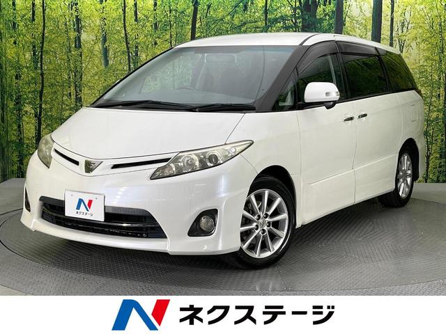 トヨタ ２．４アエラス　Ｇエディション　フリップダウンモニター　純正ナビ　両側電動スライドドア　禁煙車　バックカメラ　クルーズコントロール　ＨＩＤヘッドライト　スマートキー　オートエアコン　盗難防止システム　地デジ　ドアバイザー