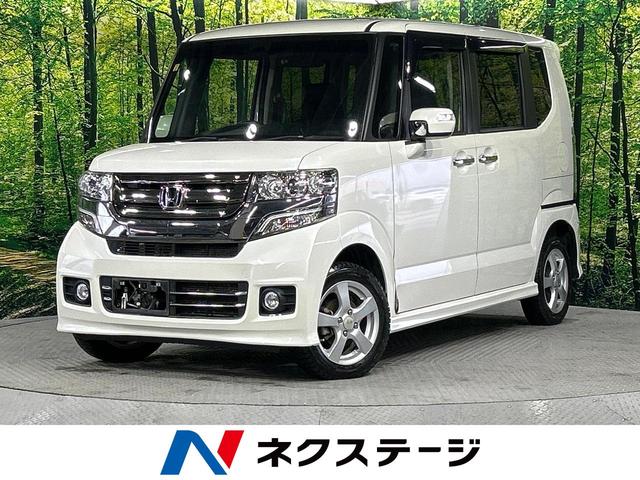 Ｇ・Ｌパッケージ　４ＷＤ　禁煙車　純正ナビ　あんしんパッケージ　電動スライドドア　ＥＴＣ　シートヒーター　バックカメラ　ＨＩＤヘッドライト　スマートキー　オートライト　オートエアコン　ＤＶＤ再生可(1枚目)