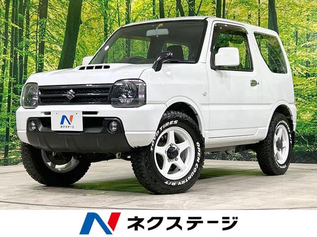 ジムニー ＸＧ　禁煙車　マニュアル車　４ＷＤ　ＥＴＣ　キーレス　衝突安全ボディ　純正１６インチＡＷ　パワーウインドウ　盗難防止システム　ドアバイザー（1枚目）