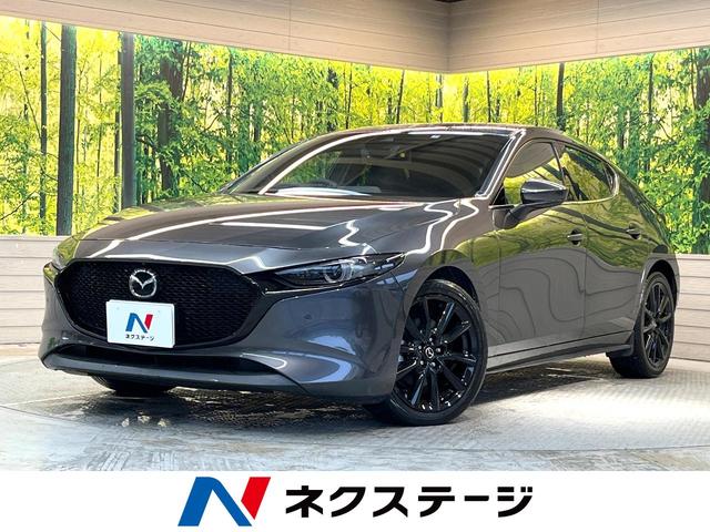 ＭＡＺＤＡ３ファストバック Ｘ　Ｌパッケージ　１０．２５型マツダコネクトナビ　全周囲カメラ　レーダークルーズ　シートヒーター　ハンドルヒーター　クリアランスソナー　パドルシフト　メモリー機能付パワーシート　スマートキー　ワンオーナー　禁煙車（1枚目）