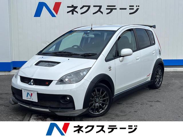 沖縄県豊見城市の中古車ならコルト ラリーアート　バージョンＲ　５速ＭＴ　ＲＥＣＡＲＯシート　ＳＤナビ　Ｂｌｕｅｔｏｏｔｈ再生　フルセグ　ＨＩＤヘッドライト　オートライト　革巻きステアリング　純正１６インチアルミホイール　プライバシーガラス　シートリフター　ＴＲＣ