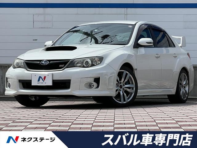 スバル インプレッサ ＷＲＸ　ＳＴｉ　禁煙車　大型リアスポイラー　パワーシート　カロッツェリアナビ　バックカメラ　ハーフレザー　パワーシート　純正１８インチアルミ　オートエアコン　Ｓ－Ｉドライブ　ＨＩＤヘッド　６ＭＴ　ＥＴＣ