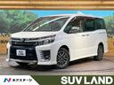 ヴォクシー ＺＳ　煌ＩＩ　４ＷＤ　後席モニター　両側電動スライドドア　セーフティセンス　禁煙車　純正１０型ナビ　バックカメラ　ＥＴＣ　フルセグ　Ｂｌｕｅｔｏｏｔｈ　ドライブレコーダー　ＬＥＤヘッド　ＬＥＤフォグ（1枚目）