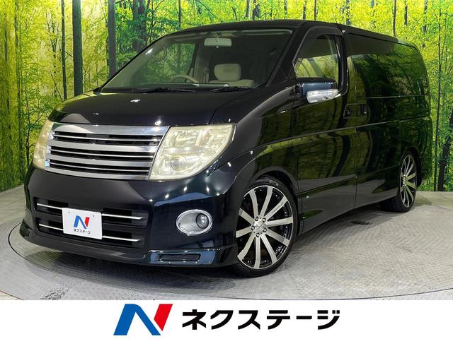 日産 エルグランド Ｖエアロ　禁煙車　メーカーオプションナビ　リアエンターテインメントシステム　両側電動スライドドア　１００Ｖ電源　ＥＴＣ　ローダウンサスペンション　６スピーカー　ダブルエアコン　電動格納ミラー