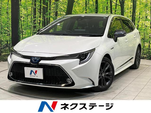 カローラツーリング ハイブリッド　ダブルバイビー　禁煙車　純正９型ディスプレイオーデイオ　フルセグＴＶ　バックカメラ　ドライブレコーダー　ＬＥＤ　スマートキー　レーダークルーズ　ブレーキホールド　合皮ブラックシート　ＥＴＣ　Ｂｌｕｅｔｏｏｔｈ　雹害車（1枚目）