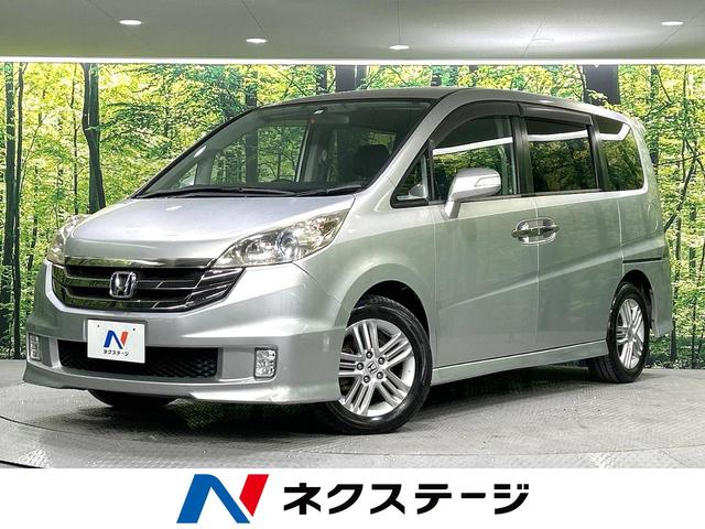 ステップワゴン スパーダＳ　Ｚ　ＨＤＤナビパッケージ　電動スライドドア　禁煙車　純正ナビ　バックカメラ　ＥＴＣ　ＨＩＤヘッドライト　革巻きステアリング　ステアリングスイッチ　オートエアコン　フォグライト　ＤＶＤ再生　地デジ　盗難防止装置　横滑防止装置（1枚目）