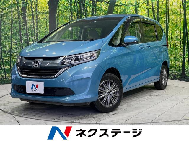 フリード Ｇ・ホンダセンシング　４ＷＤ　両側電動スライドドア　ホンダセンシング　純正ＳＤナビ　アダプティブクルーズ　寒冷地仕様　バックカメラ　ＥＴＣ　Ｂｌｕｅｔｏｏｔｈ　フルセグ　前席シートヒーター　ＬＥＤヘッドライト（1枚目）