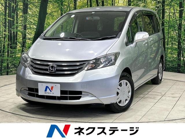 フリード(ホンダ) Ｇ　ジャストセレクション　７人乗り　純正インターナビ　バックカメラ　ＥＴＣ　ステアリングスイッチ 中古車画像