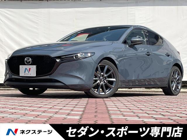 マツダ ＭＡＺＤＡ３ファストバック １５Ｓツーリング　６ＭＴ　禁煙車　マツダコネクトナビ　バックカメラ　スマートブレーキサポート　車線逸脱警報システム　レーダークルーズコントロール　ブラインドスポットモニタリング　ＬＥＤヘッドランプ　純正１８インチＡＷ