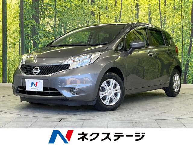 日産 ノート Ｘ　純正ＳＤナビ　衝突軽減装置　バックカメラ　Ｂｌｕｅｔｏｏｔｈ再生　ＥＴＣ　車線逸脱警報　スマートキー　オートライト　ステアリングスイッチ　ＤＶＤ再生　地デジ　盗難防止装置　プライバシーガラス