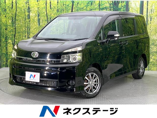 トヨタ ヴォクシー Ｘ　純正ナビ　電動スライドドア　禁煙車　バックカメラ　ＥＴＣ　Ｂｌｕｅｔｏｏｔｈ再生　地デジ　キーレスエントリー　ＨＩＤヘッドライト　ヘッドライトレベライザー　ドアバイザー　プライバシーガラス