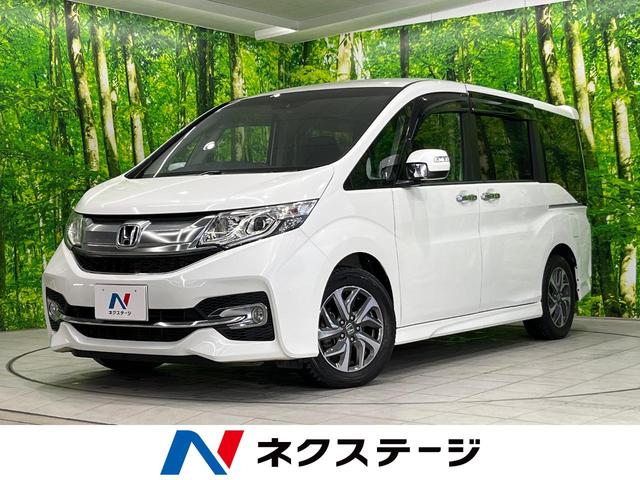 ホンダ ステップワゴンスパーダ スパーダアドバンスパッケージβ　ナビ　後席モニター　両側電動　フルセグ　バックカメラ　ＥＴＣ　ＬＥＤヘッド　オートエアコン　スマートキー　電動格納ミラー　アイドリングストップ　プライバシーガラス