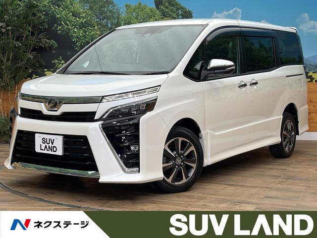 ヴォクシー(トヨタ) ＺＳ　煌ＩＩ　禁煙車　４ＷＤ　７人乗り　フリップダウンモニター　寒冷地仕様 中古車画像