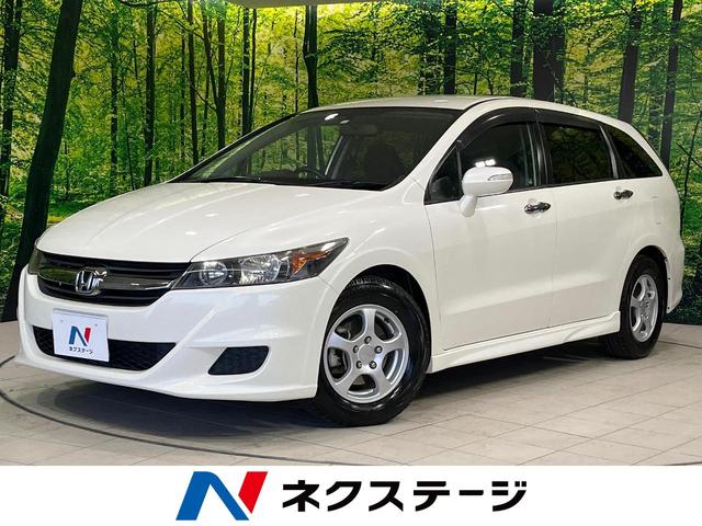 ホンダ ストリーム ＺＳ　ＨＤＤナビパッケージ　禁煙車　純正ナビ