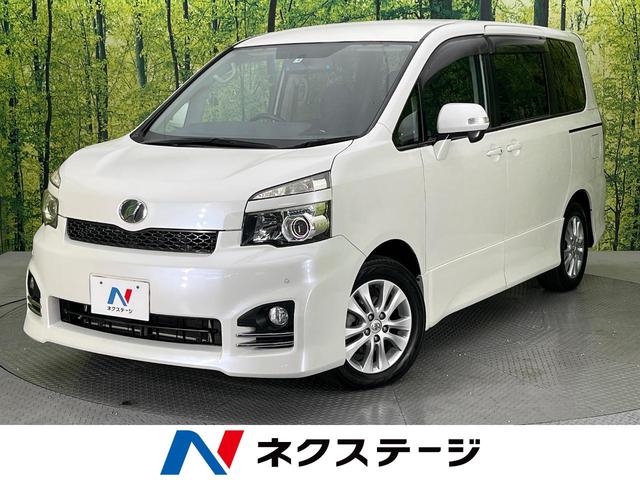 トヨタ ヴォクシー ＺＳ　純正ナビ　パワースライドドア　バックカメラ　ＥＴＣ　禁煙車　Ｂｌｕｅｔｏｏｔｈ再生　フルセグＴＶ　ＨＩＤヘッドライト　オートエアコン　電動格納ミラー　盗難防止システム　ドアバイザー