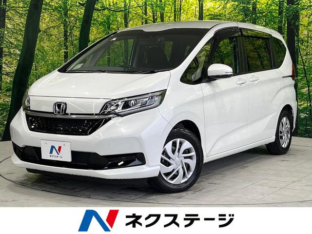 ホンダ フリード Ｇ　９インチナビ　両側電動スライドドア　フリップダウンモニター　ホンダセンシング　禁煙車　アイドリングストップ　ＬＥＤ　ドラレコ　ＥＴＣ　パワーステアリング　スマートキー　オートライト　前席シートヒーター