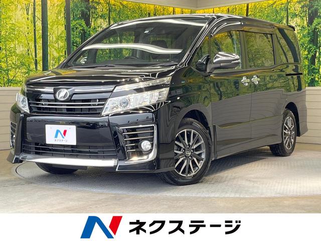 トヨタ ヴォクシー ＺＳ　煌　禁煙車　９インチナビ　トヨタセーフティセンス　両側電動スライドドア　バックカメラ　ＥＴＣ　ＬＥＤヘッドライト＆フォグ　スマートキー　フルセグＴＶ　ＤＶＤ　ＣＤ　オートエアコン　オートライト　純正アルミ