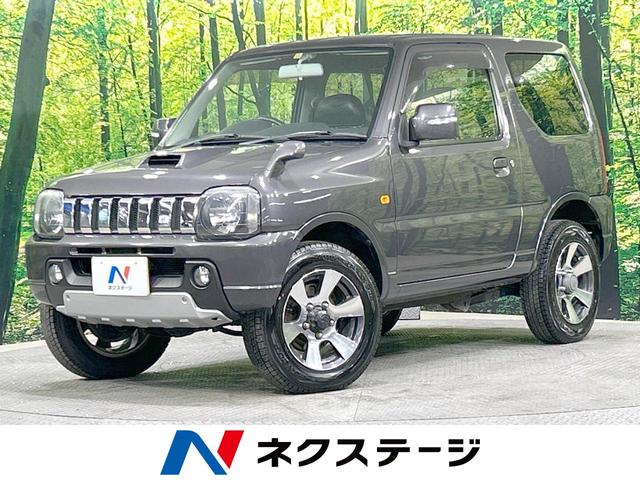 スズキ ジムニー クロスアドベンチャーＸＣ　４ＷＤ　ターボ　禁煙車　ＫＥＮＷＯＯＤ製ナビ　シートヒーター　純正１６インチアルミホイール　純正革巻きステアリング　フォグライト　ヘッドライトレベライザー　ＣＤ再生　盗難防止装置　横滑り防止装置