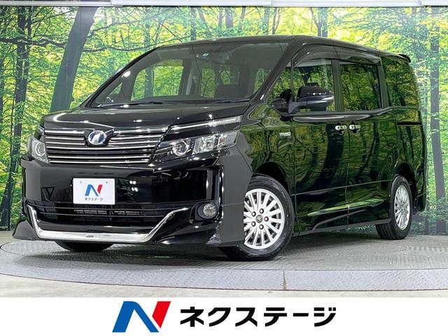 ハイブリッドＶ　禁煙車　９インチナビ　後席モニター　シートヒーター　両側電動スライドドア　クルーズコントロール　フルセグＴＶ　Ｂｌｕｅｔｏｏｔｈ　バックカメラ　ＣＤ／ＤＶＤ　ＬＥＤライト　オートライト　ＥＴＣ