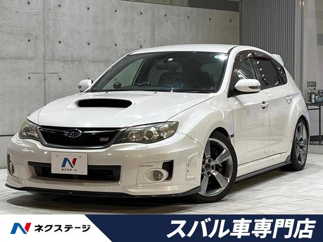 スバル ＷＲＸ　ＳＴｉ　ＳＴＩエアロ　ＨＫＳマフラー　Ｐｅｒｓｏｎａｌ製ステアリング　６ＭＴ　純正ＳＤナビ　オートエアコン　ＨＩＤヘッド　純正１８インチアルミ　フロントフォグ　ヘッドランプウォッシャー　スマートキー