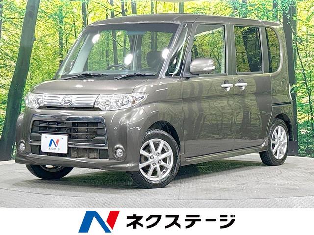 タント(ダイハツ) カスタムＸ　４ＷＤ　禁煙車　電動スライドドア　純正ナビ　スマートキー　ＨＩＤヘッド 中古車画像