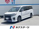 ヴォクシー ＺＳ　煌ＩＩ　禁煙車　フリップダウンモニター　純正ＳＤナビ　衝突被害軽減装置　両側電動スライドドア　Ｂｌｕｅｔｏｏｔｈ接続　バックカメラ　ＥＴＣ　オートマチックハイビーム　スマートキー＆プッシュスタート　ＡＢＳ（1枚目）