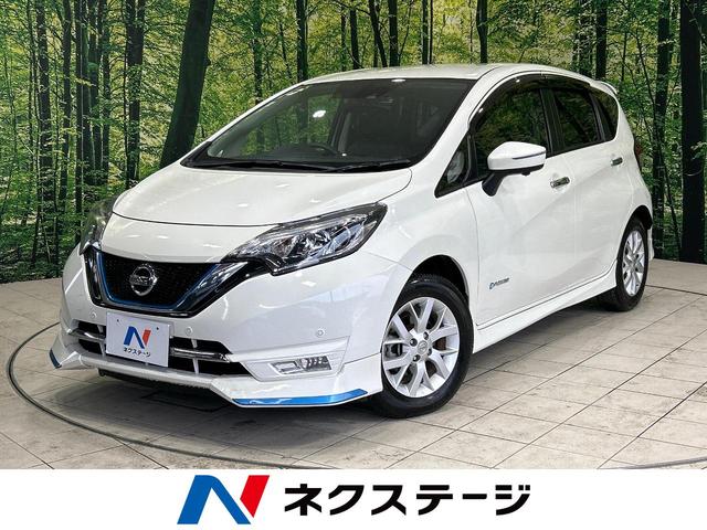 日産 ノート ｅ－パワー　メダリスト　純正ナビ　アラウンドビューモニター　バックカメラ　エマージェンシーブレーキ　インテリジェントルームミラー　ＬＥＤヘッドランプ　純正１５インチアルミ　純正革巻きステアリング　Ｂｌｕｅｔｏｏｔｈ接続