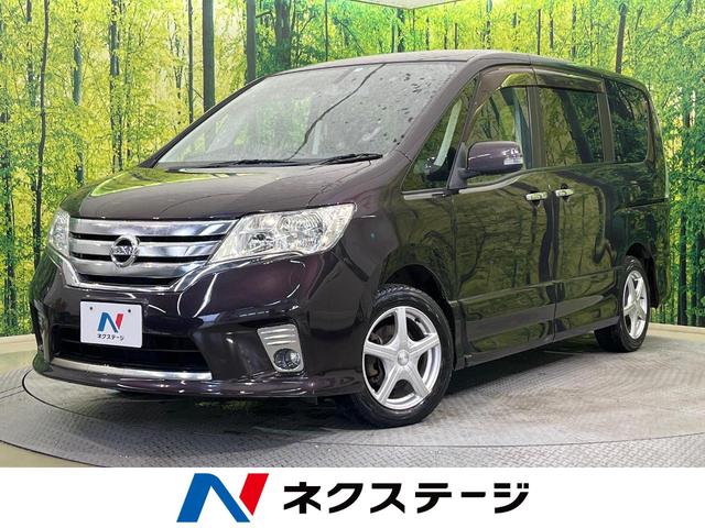 日産 セレナ ハイウェイスター　Ｖセレクション　フリップダウンモニター　両側パワスラ　純正ナビ　バックカメラ　ＥＴＣ　リアオートエアコン　フルセグ　クルーズコントロール　ＨＩＤヘッド　禁煙車　横滑り防止装置　１５インチアルミ　スマートキー