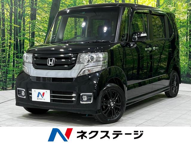 ホンダ Ｎ－ＢＯＸカスタム Ｇ　ＳＳブラックスタイルパッケージ　両側電動スライドドア　純正ナビ　禁煙車　バックカメラ　ＥＴＣ　シートヒーター　純正１４インチアルミホイール　ＨＩＤヘッドライト　スマートキー　オートエアコン　盗難防止装置　電動格納式ドアミラー