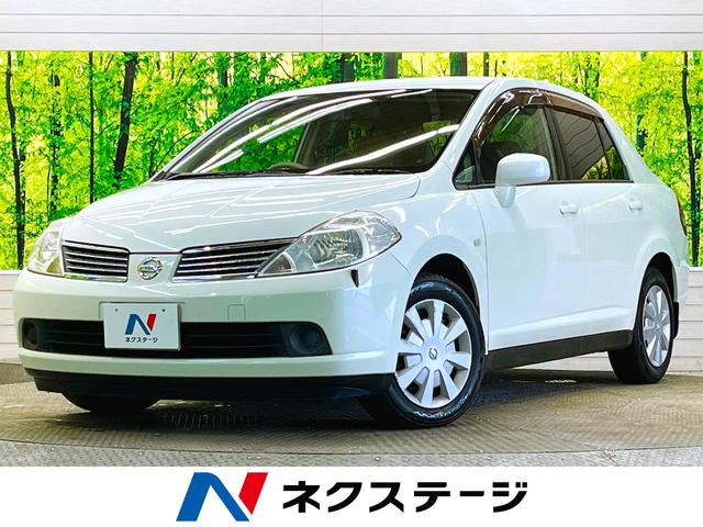 日産 ティーダラティオ １５Ｍ　禁煙車　ディスプレイオーディオ　ブラウン木目調インパネ　オートエアコン　オートライト　電動格納ミラー　アイボリー内装　ＣＤ／ＤＶＤ再生　ＵＳＢ／ＡＵＸ接続　バニティミラー