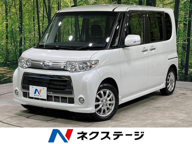 ダイハツ タント カスタムＲＳ　ターボ　４ＷＤ　電動スライドドア　禁煙車　ＳＤナビ　バックカメラ　スマートキー　ＨＩＤヘッドライト　フォグライト　ＣＤ／ＤＶＤ再生　盗難防止装置　プライバシーガラス　アイドリングストップ　ベンチシート