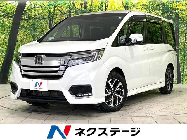 ホンダ ステップワゴンスパーダ スパーダ　ホンダセンシング　４ＷＤ　両側電動スライドドア　衝突軽減装置　フリップダウンモニター　寒冷地仕様　純正ナビ　バックカメラ　ＬＥＤヘッドライト　ＥＴＣ　Ｂｌｕｅｔｏｏｔｈ再生　フルセグ　車線逸脱警報　横滑り防止装置